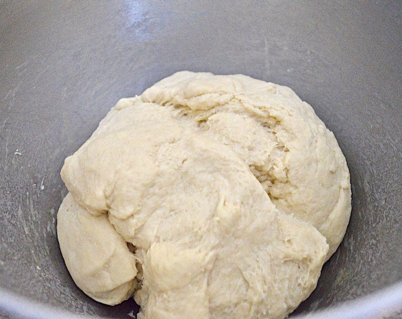 step 4 Add in the Eggland's Best Classic Eggs (2), and run the dough hook on low to start mixing it all together until it starts to form a dough. Turn the speed up one more notch and let the hook kneed the dough for 3-4 minutes to really work it together.