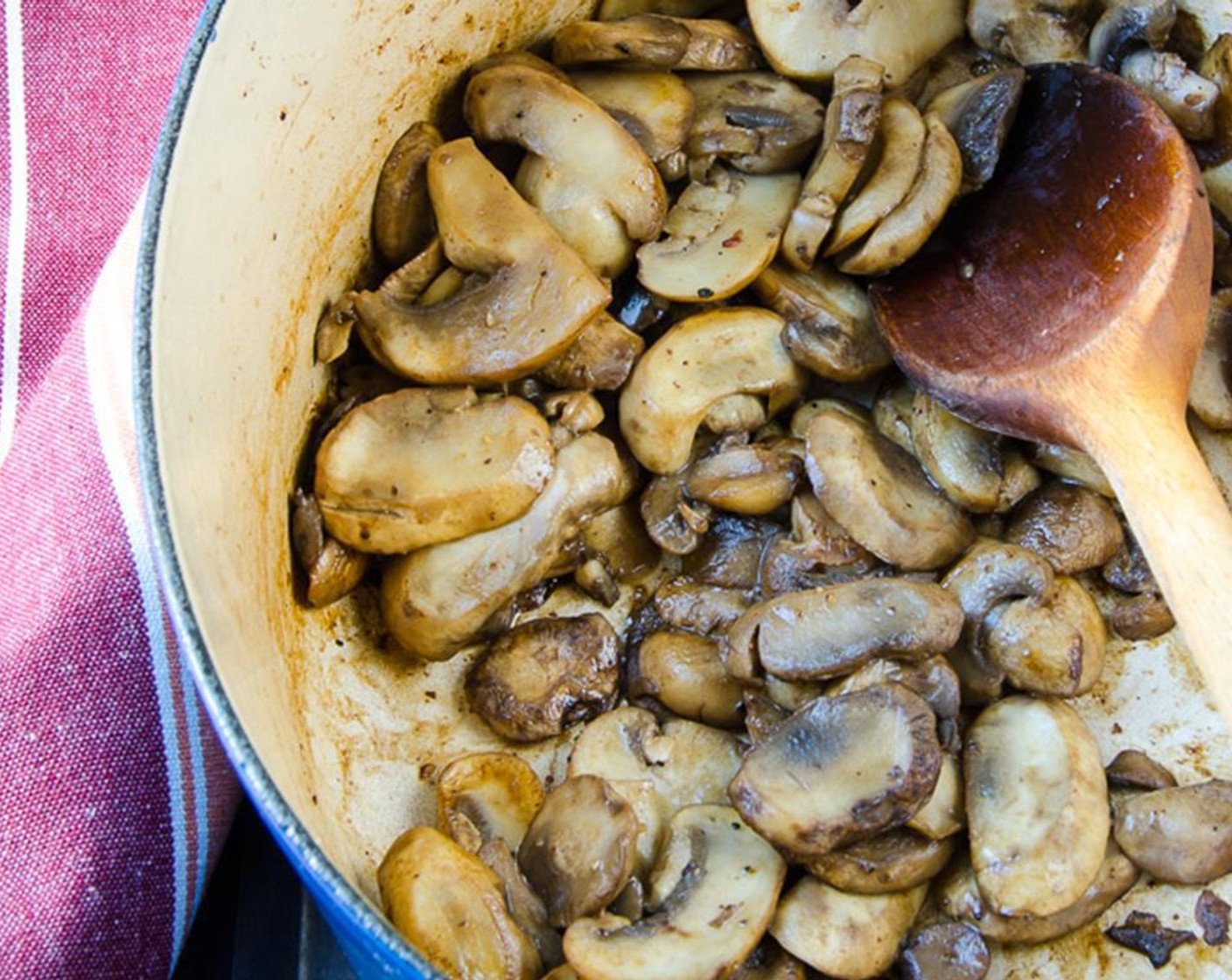 step 4 Transfer the meat to a platter and add the Button Mushrooms (4 1/2 cups) with a sprinkle of salt. Stir and place the lid on the pan until the mushrooms start to give up their liquid. Cook for 5 to 8 minutes, stirring occasionally
