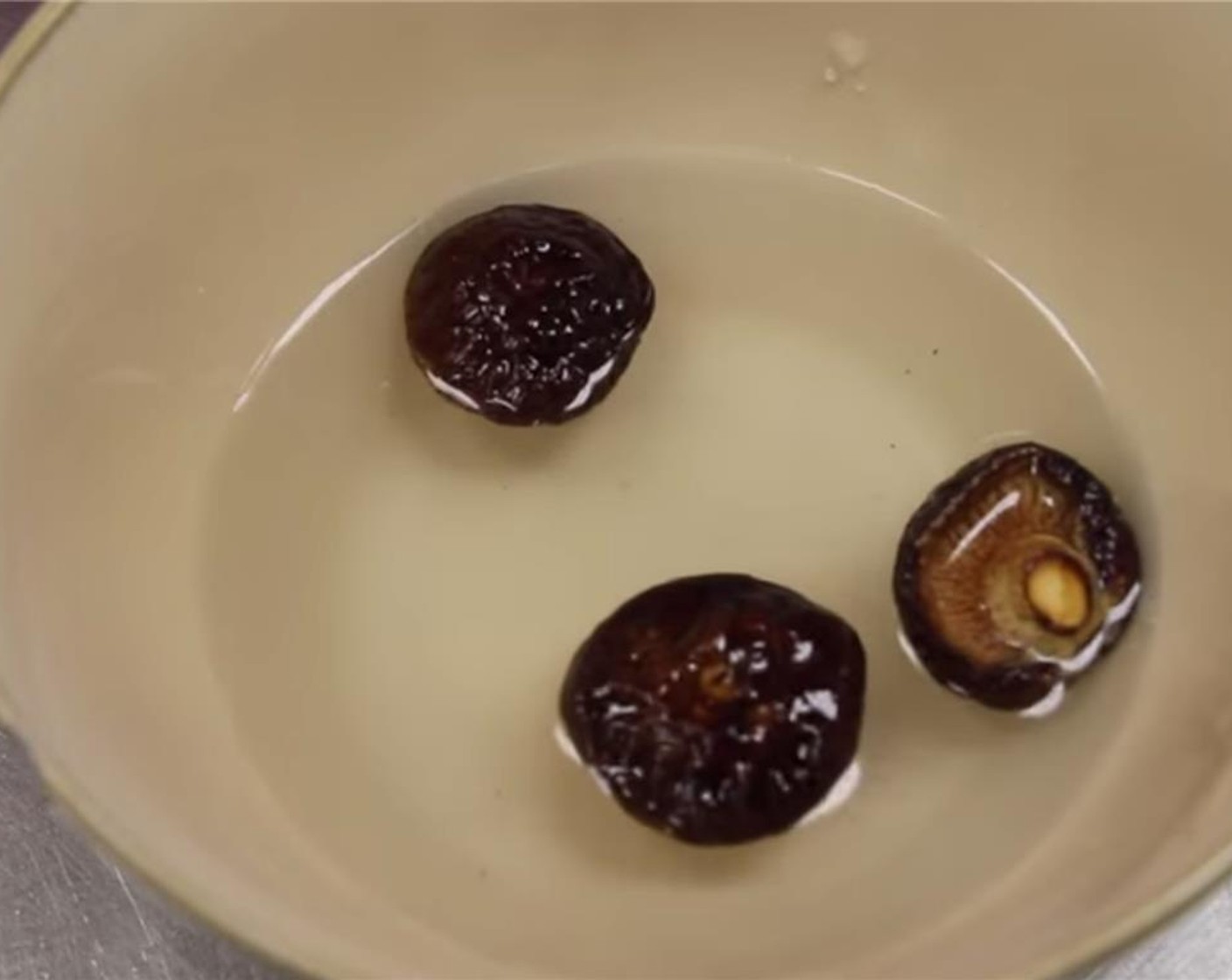 step 1 Soak the Shiitake Mushrooms (3) in hot water for 30 minutes to 1 hour.