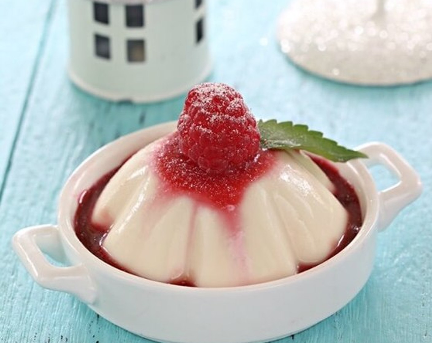 step 6 To serve, pour some raspberry coulis over pudding and put Fresh Raspberries (to taste) on top. Dust with some Powdered Confectioners Sugar (to taste) if you prefer. Enjoy!