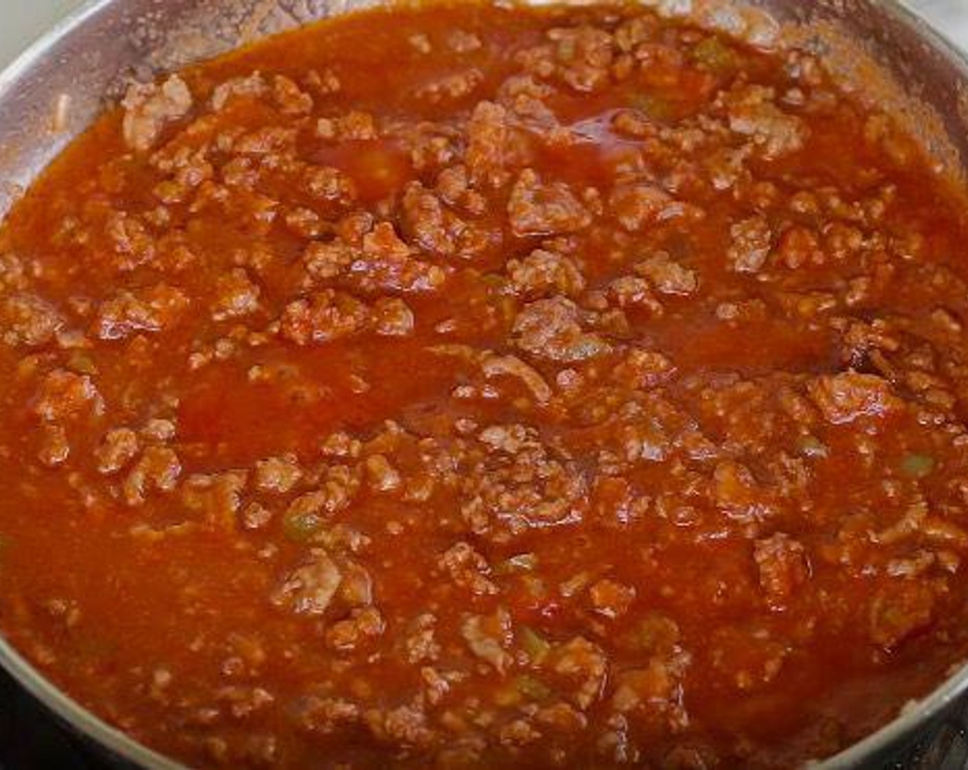 step 3 Add Tomato Sauce (1 cup), Tomato Paste (2 Tbsp), Brown Sugar (1 Tbsp), and Water (1/2 cup). Stir to combine. Lower the heat to low, cover the meat sauce and cook for 15 to 20 minutes. Served with hot buns and enjoy!