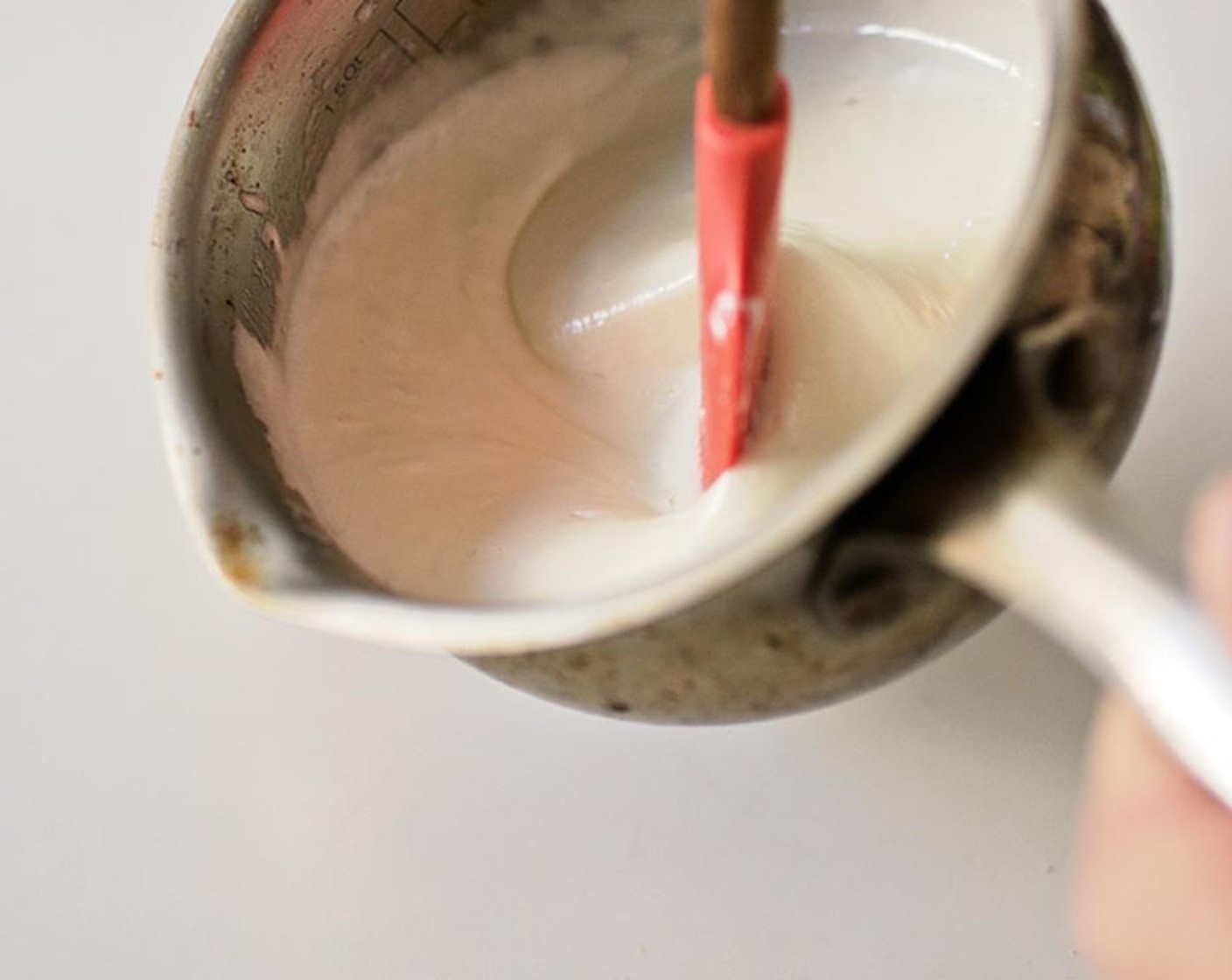 step 1 Melt the Butter (1 stick) in a saucepan. Add Mini Marshmallows (5 cups) and mix until completely melted.