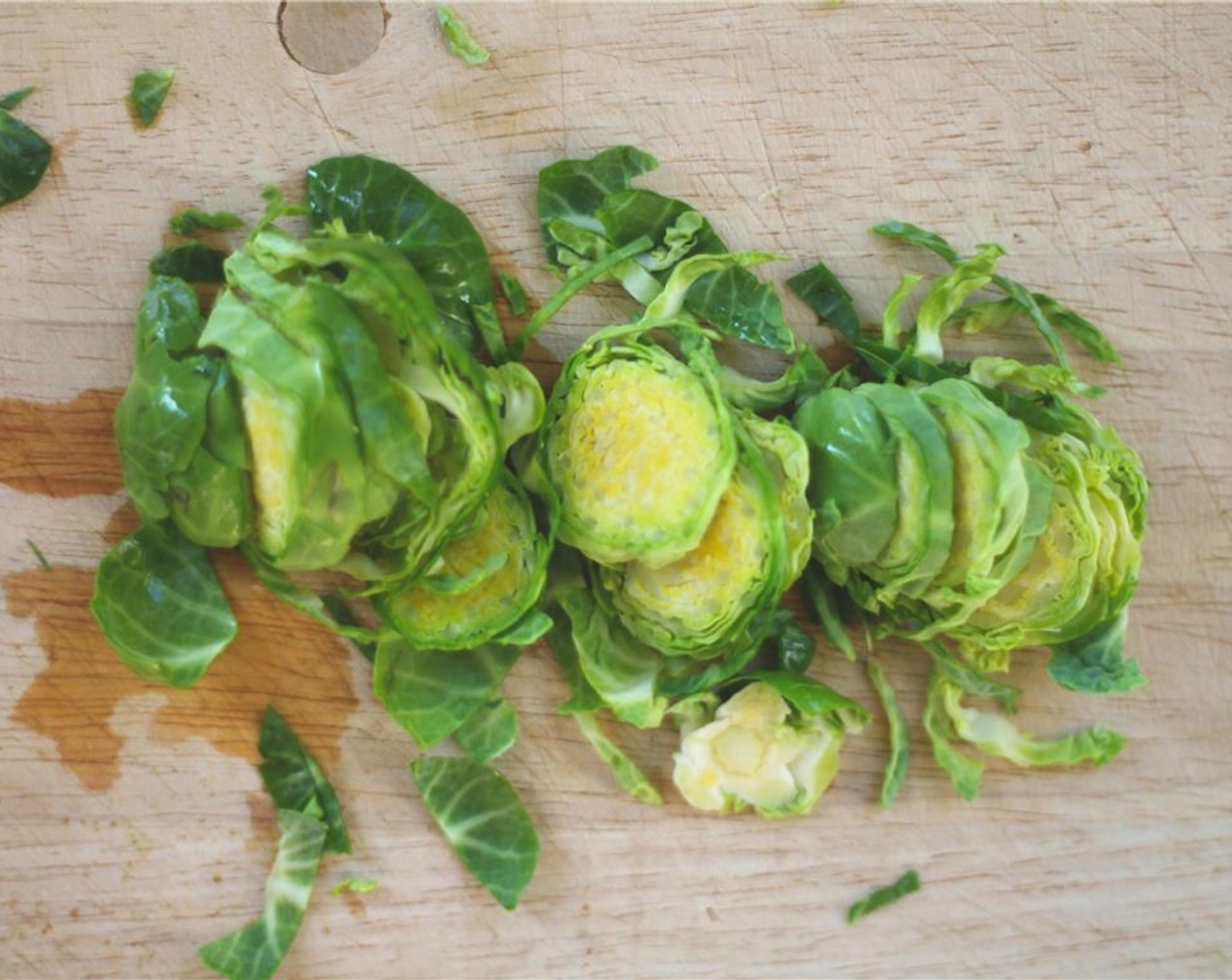 step 1 Shred your Brussels Sprouts (40) by first cutting off the bottom third of the sprout, and then using a good knife, mandoline, or food processor chopping attachment.