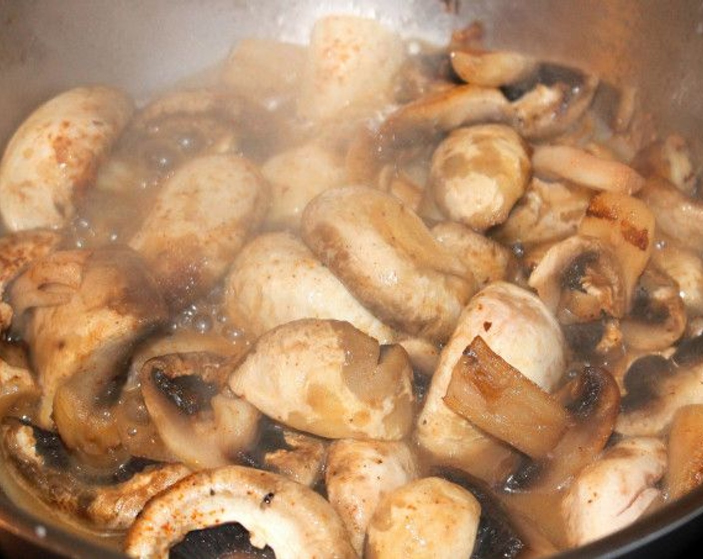 step 5 Place quartered Button Mushrooms (4 cups) in a hot pan and season with some Kosher Salt (to taste).