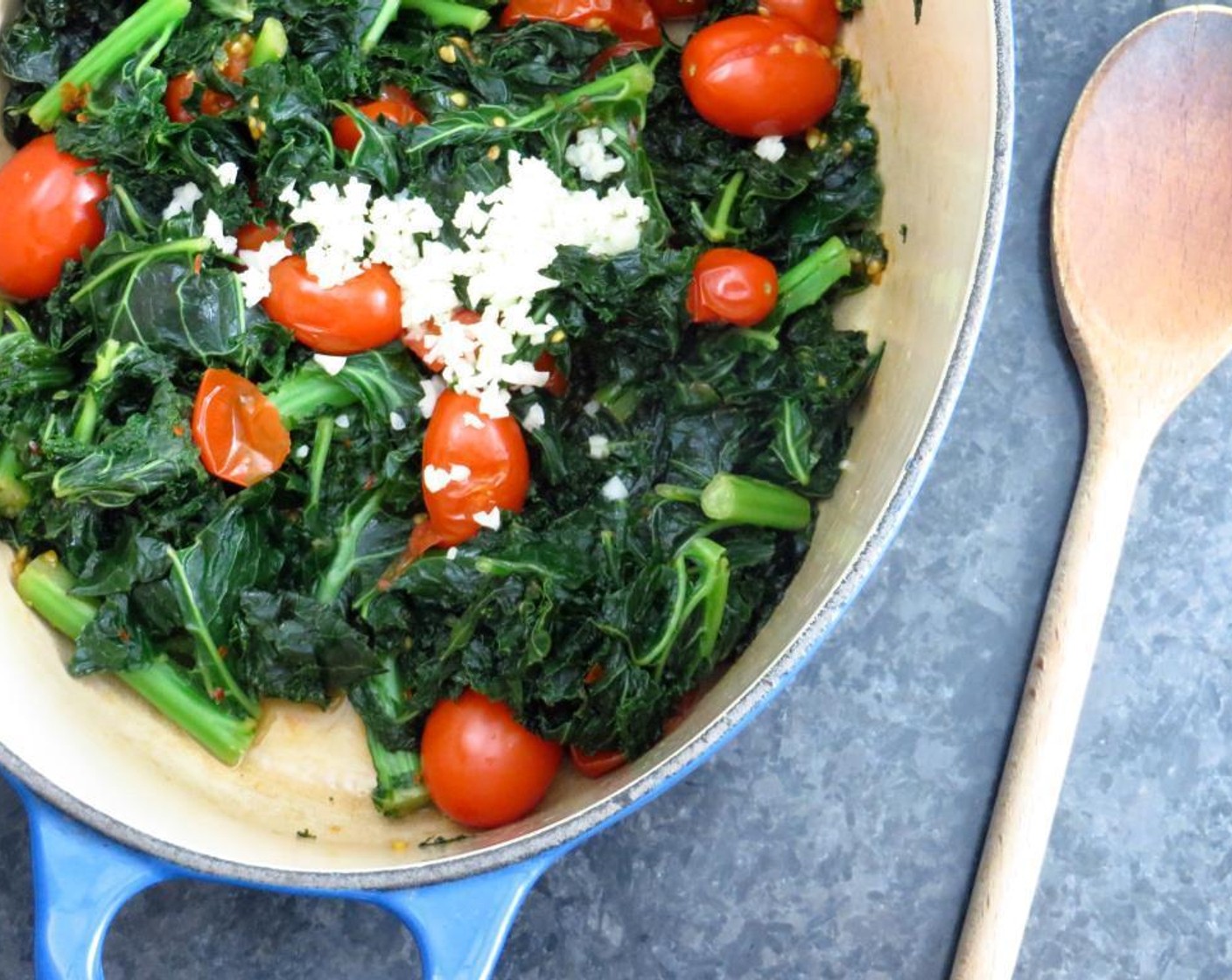 step 2 Add Kale (9 cups) to the pot and 1/3 of the Vegetable Stock (3/4 cup). Cover with a lid, and braise the kale for 2-3 minutes, until wilted. Then add Crushed Red Pepper Flakes (1/4 tsp), Grape Tomatoes (1 cup), Garlic (1 clove), and another 1/3 of the vegetable stock.