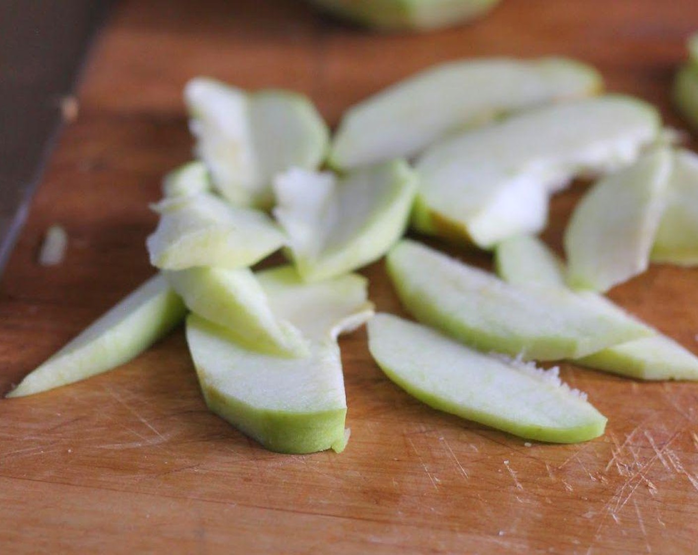 step 2 Peel, slice, and cut the  Granny Smith Apples (1 1/2) into 8 wedges and sliced 1/8-inches thick.