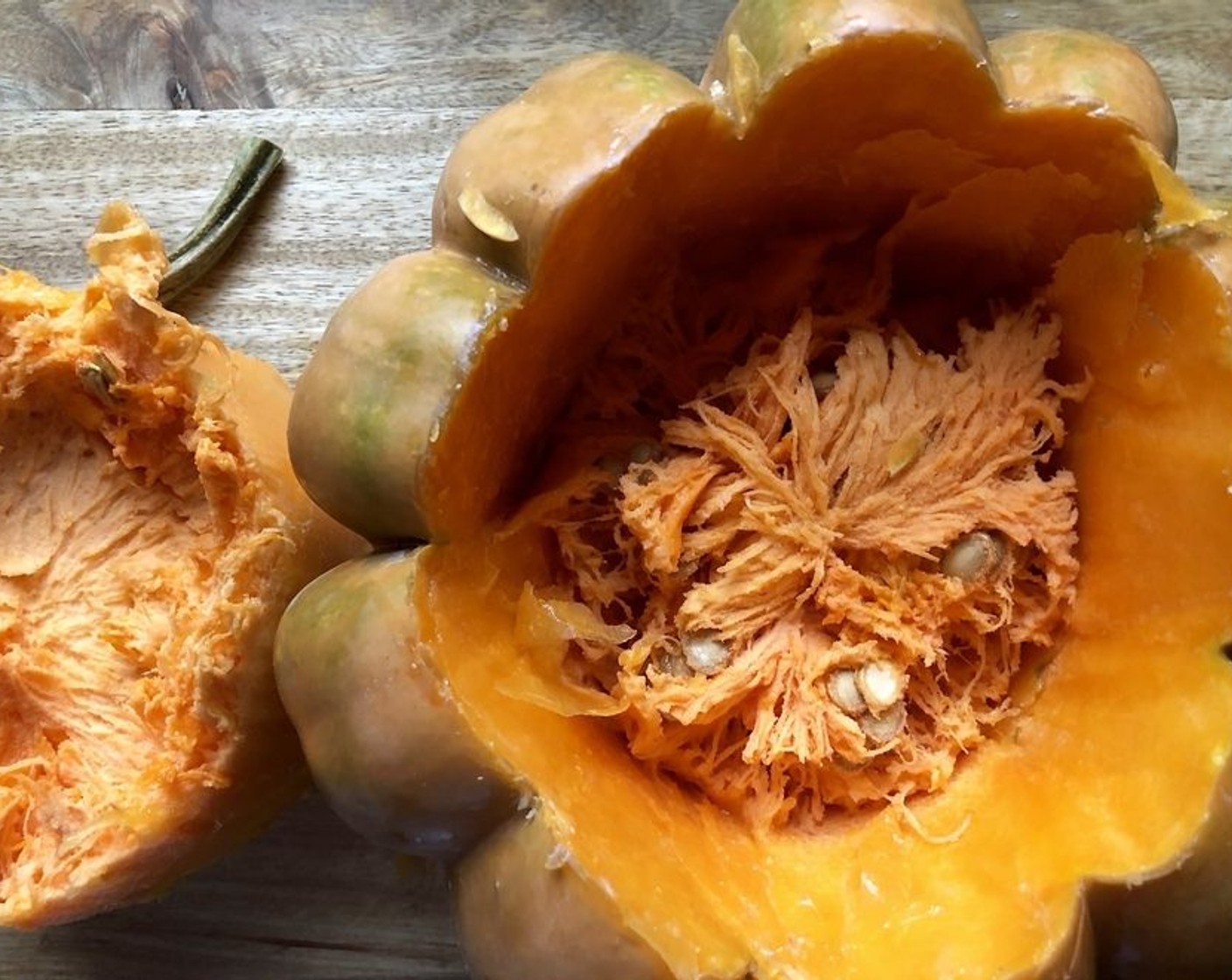 step 2 To roast fresh pumpkin for the soup, halve the pumpkin; remove seeds and strings. Place cut sides down on prepared pan. Bake 1 hour or until tender; remove. Turn over and let cool.