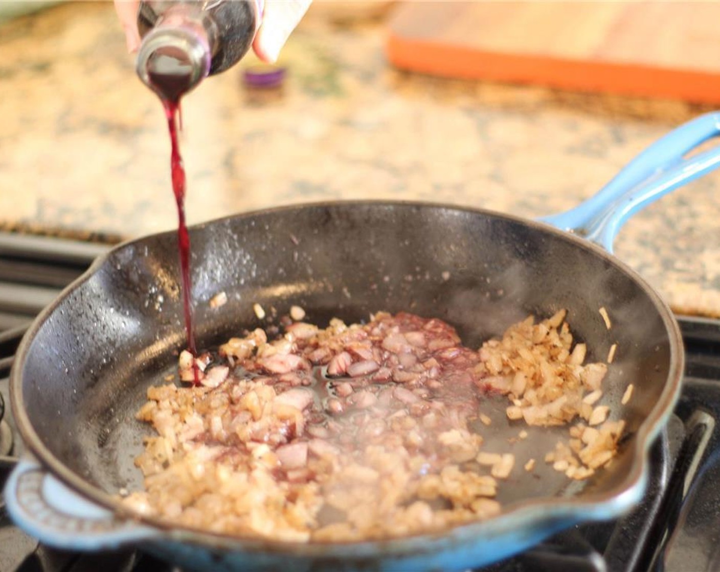 step 4 Add Shallots (2) to pan and sauté until translucent. Add Dry Red Wine (1/2 cup) to deglaze, turn heat to high, and reduce by 1/2.