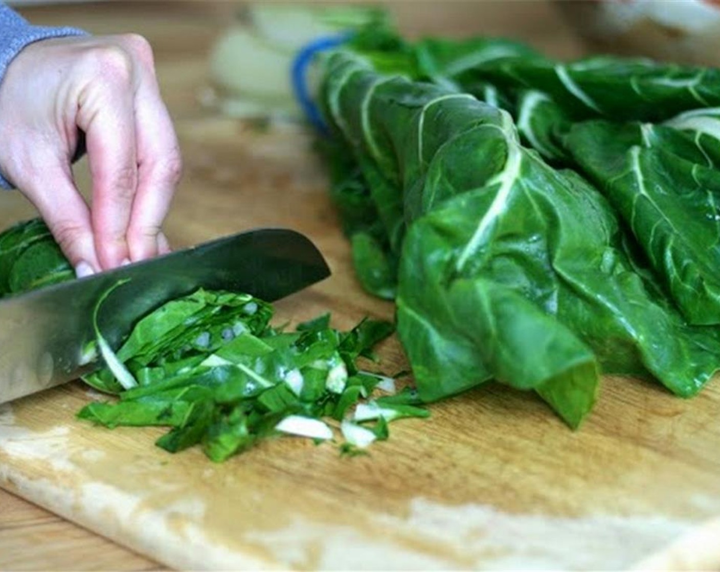 step 6 Add chopped swiss chard and saute until wilted, covering with a lid if needed.