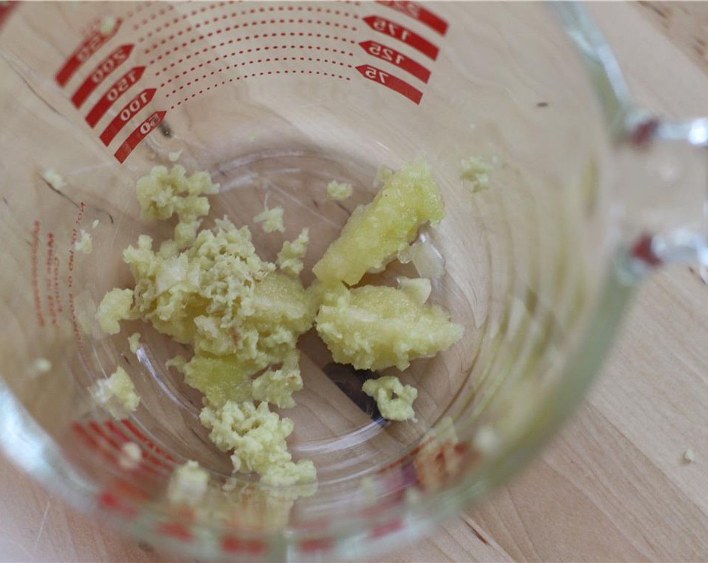 step 2 Put the garlic and ginger in a small bowl.