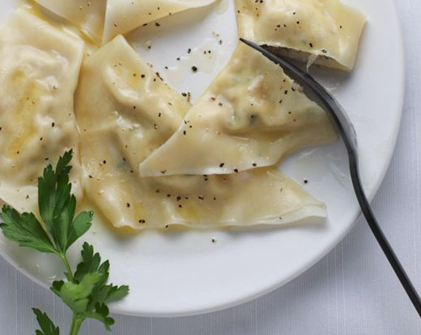 step 6 Microwave Butter (1 stick) on fifty percent power until melted. Serve pierogies with a drizzle of melted butter and Ground Black Pepper (to taste) on top.