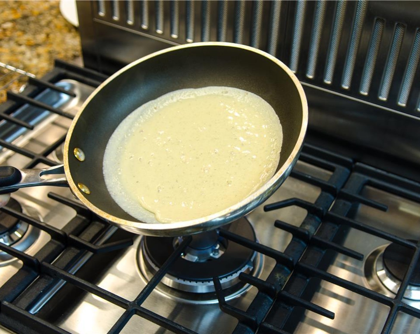 step 7 Let cook until set, about 1 – 2 minutes.  The edges should easily release, indicating the crepe is ready to flip.