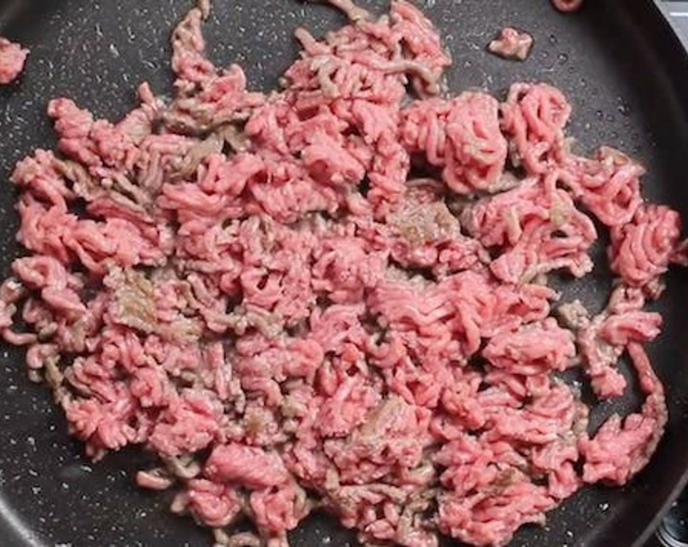 step 1 In a pan over medium to high heat add Ground Beef (1 lb). Break the beef down to small clumps and brown for 3-4 minutes.