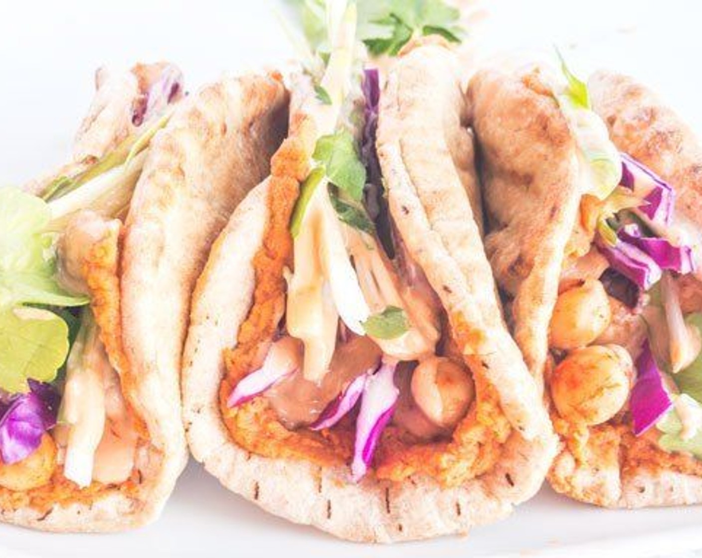 Chickpea Hummus Pitas with Spicy Tahini