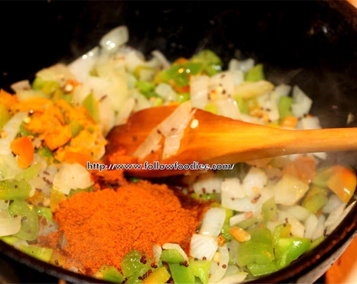 step 5 Add the green bell pepper , Ground Turmeric (1/2 tsp), Salt (to taste) and Chili Powder (2 tsp). Mix well.