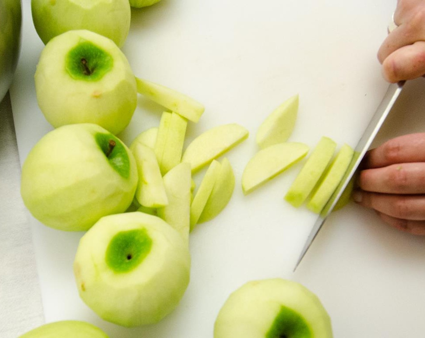 step 9 Peel and cut Granny Smith Apples (16 2/3 cups) into 1/4-inch slices and place in a large bowl.