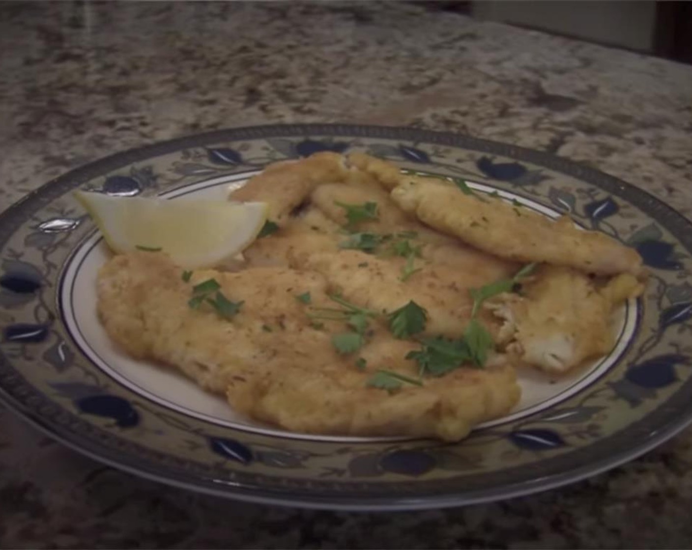 step 8 Remove to a plate, and garnish with Lemons (to taste) and Fresh Parsley (to taste).