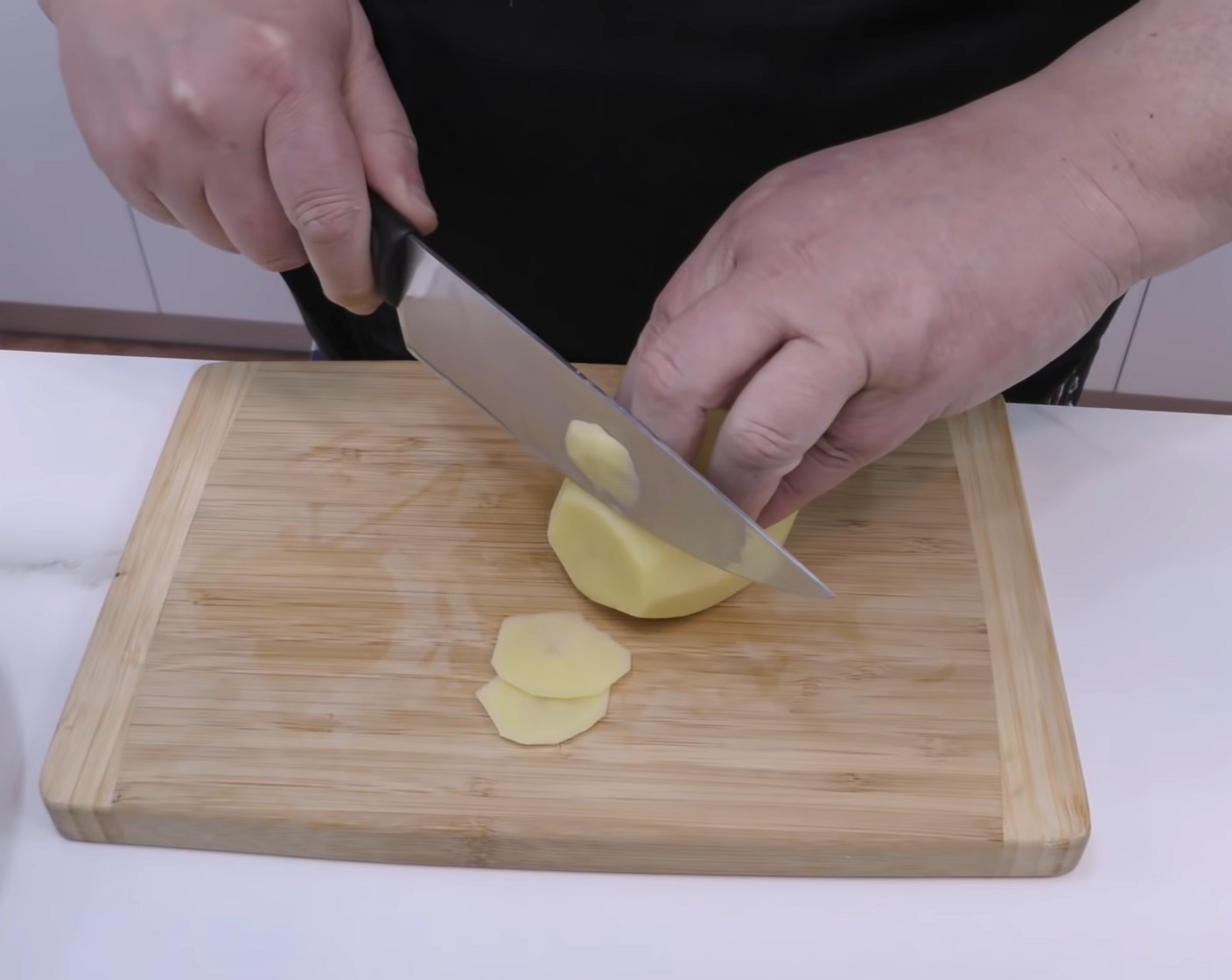 step 2 Start by cleaning, peeling, and slicing the Potatoes (3) into very thin slices. Season with Salt (to taste).