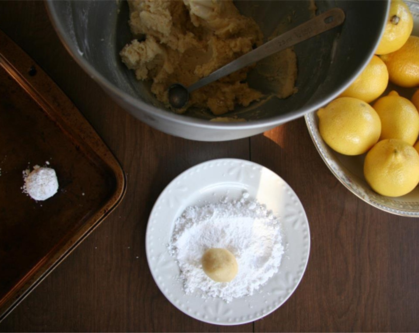 step 5 Coat the balls in the confectioners’ sugar and place onto cookie sheets. Bake for 10-11 minutes.