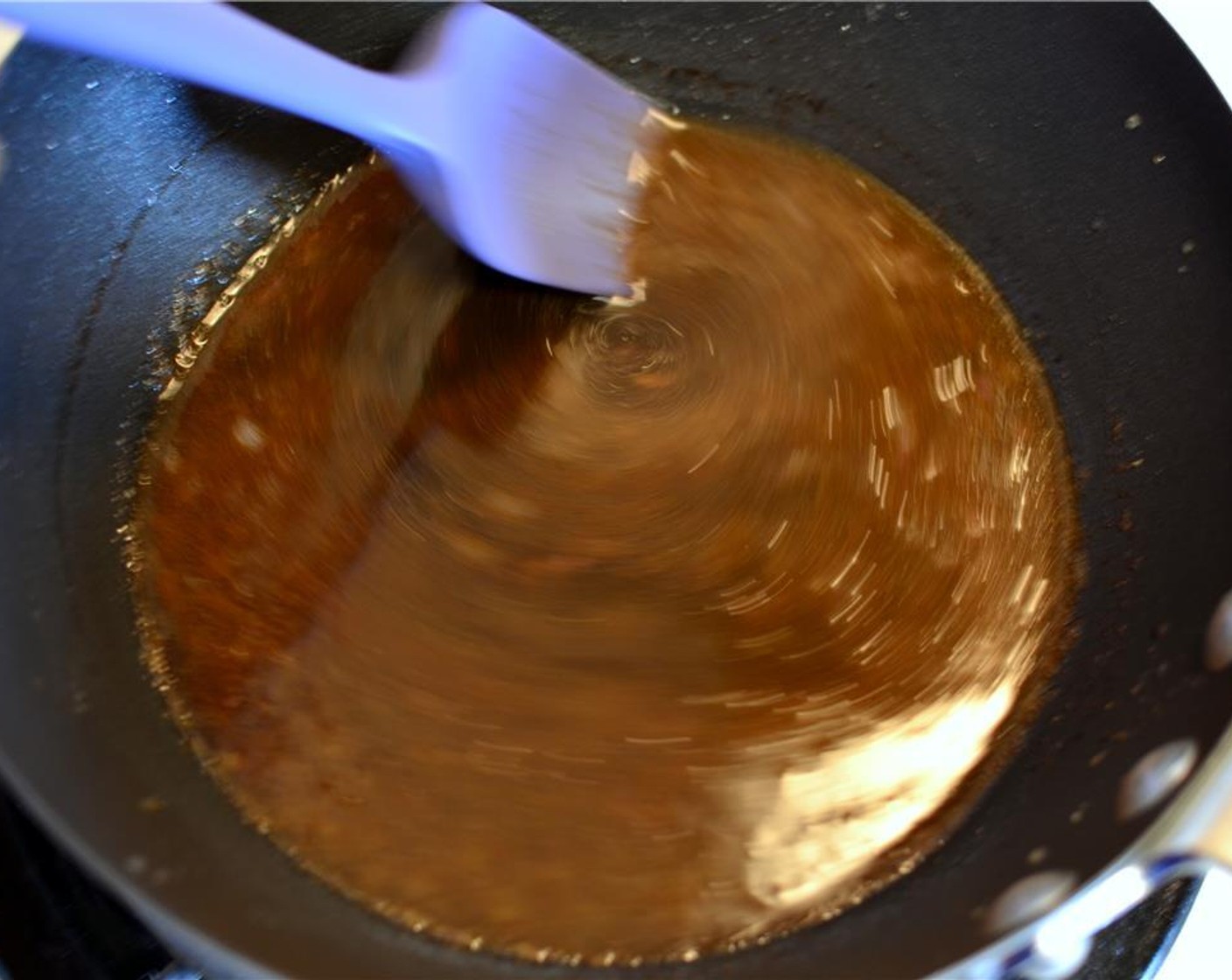 step 8 Allow the sauce to come to a boil and reduce to almost half its volume. Turn the heat off and transfer the balsamic glaze to a bowl.