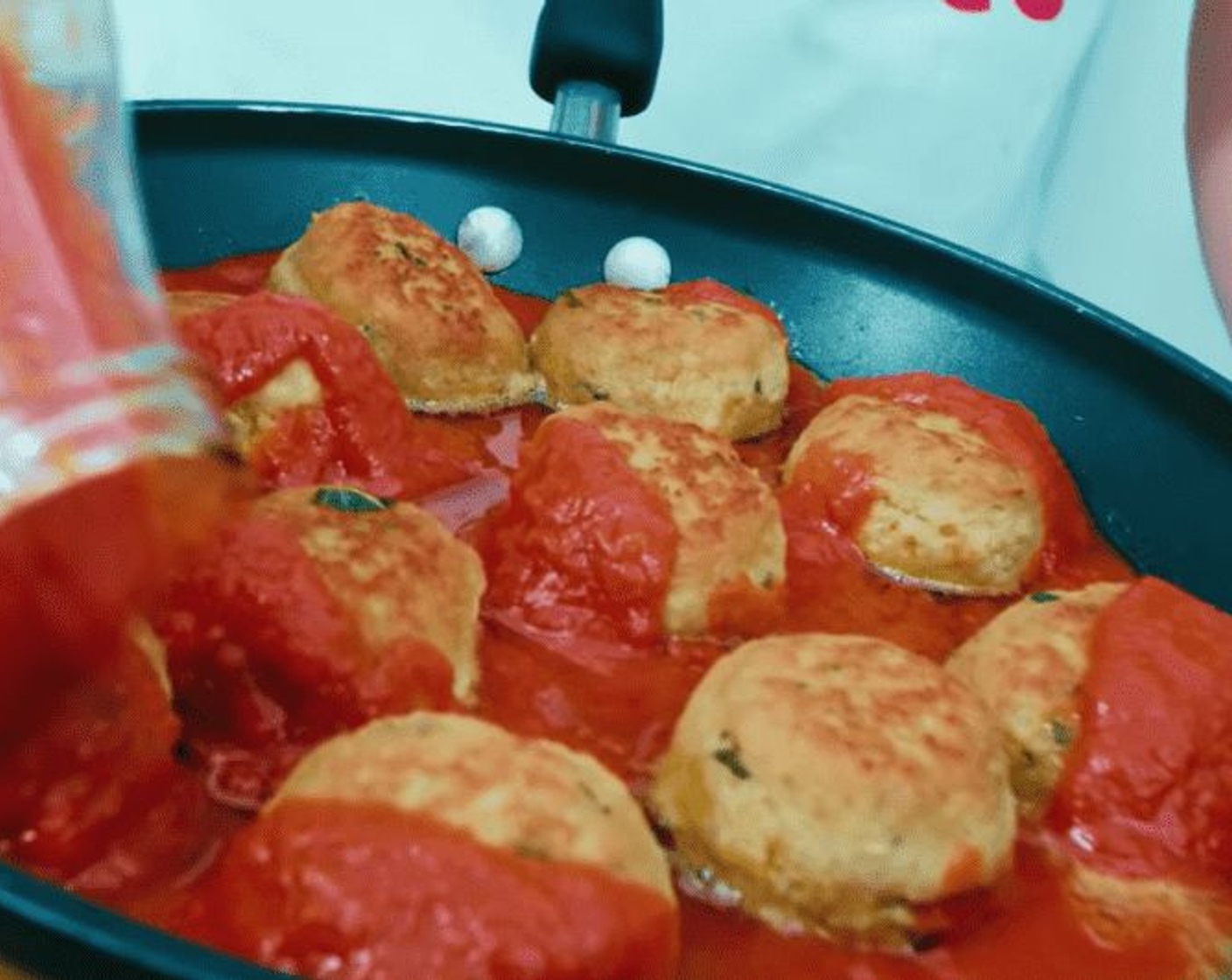 step 16 Leave them to fry a little longer, then add the tomato sauce you have prepared lathering each Italian meatball so it is completely infused with the flavor of the sauce!