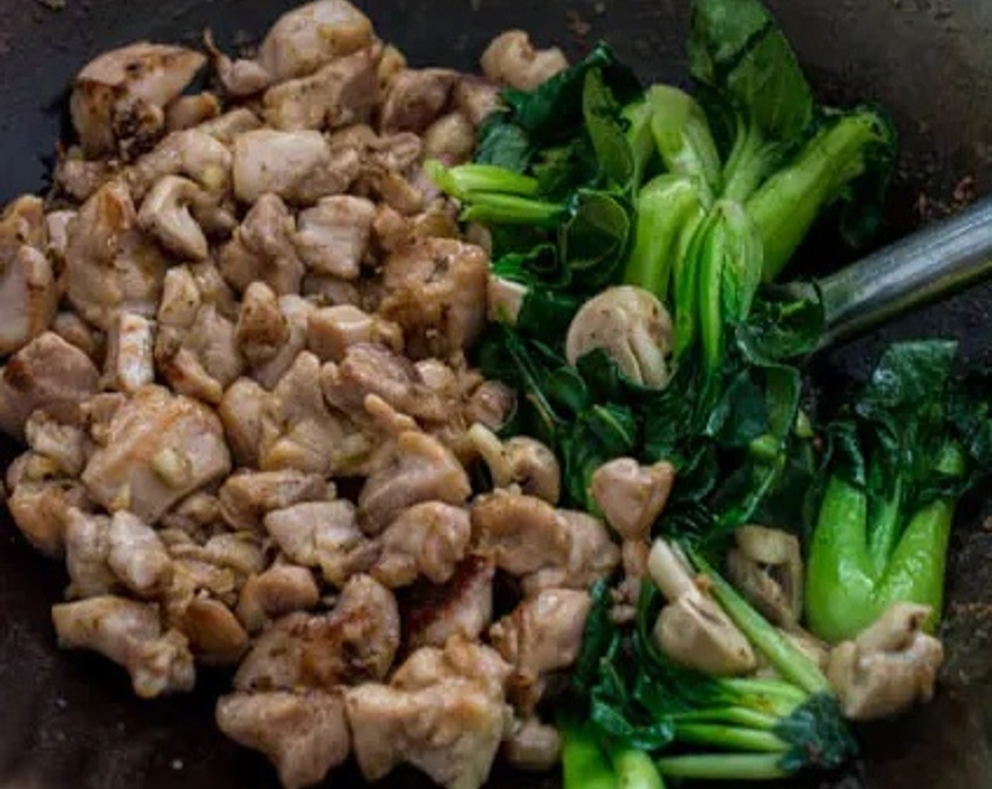 step 6 Return the chicken to the wok. Stir in the prepared sauce, then stir-fry to combine all ingredients.