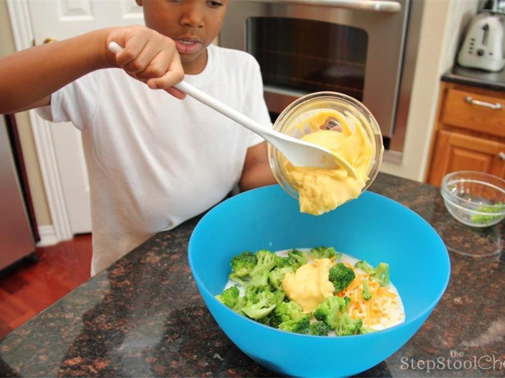 Step 6 of Chicken Broccoli and Rice Casserole Recipe: Add in the Frozen Broccoli (1 1/2 cup), Instant Rice (1 cup) and Cream of Chicken Soup (10.5 ounce).