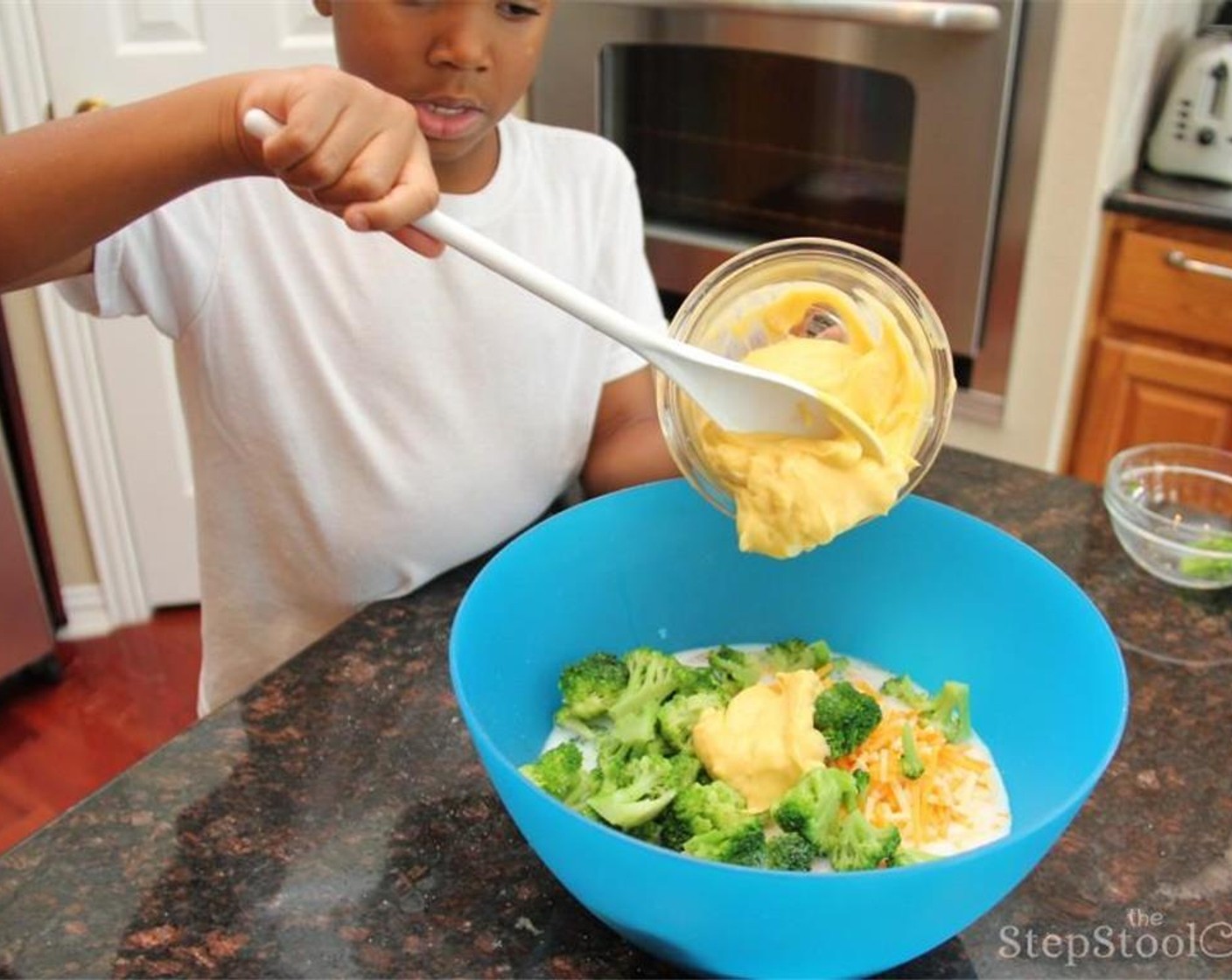 step 6 Add in the Frozen Broccoli (1 1/2 cups), Instant Rice (1 cup) and Cream of Chicken Soup (10.5 oz).