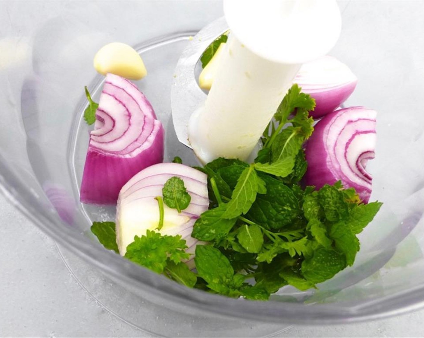 step 4 Transfer this to a large mixing bowl. Add the Shallot (1), Garlic (2 cloves), Fresh Parsley (1 handful), Fresh Cilantro (1 handful), and Fresh Mint (1 handful) to blender.