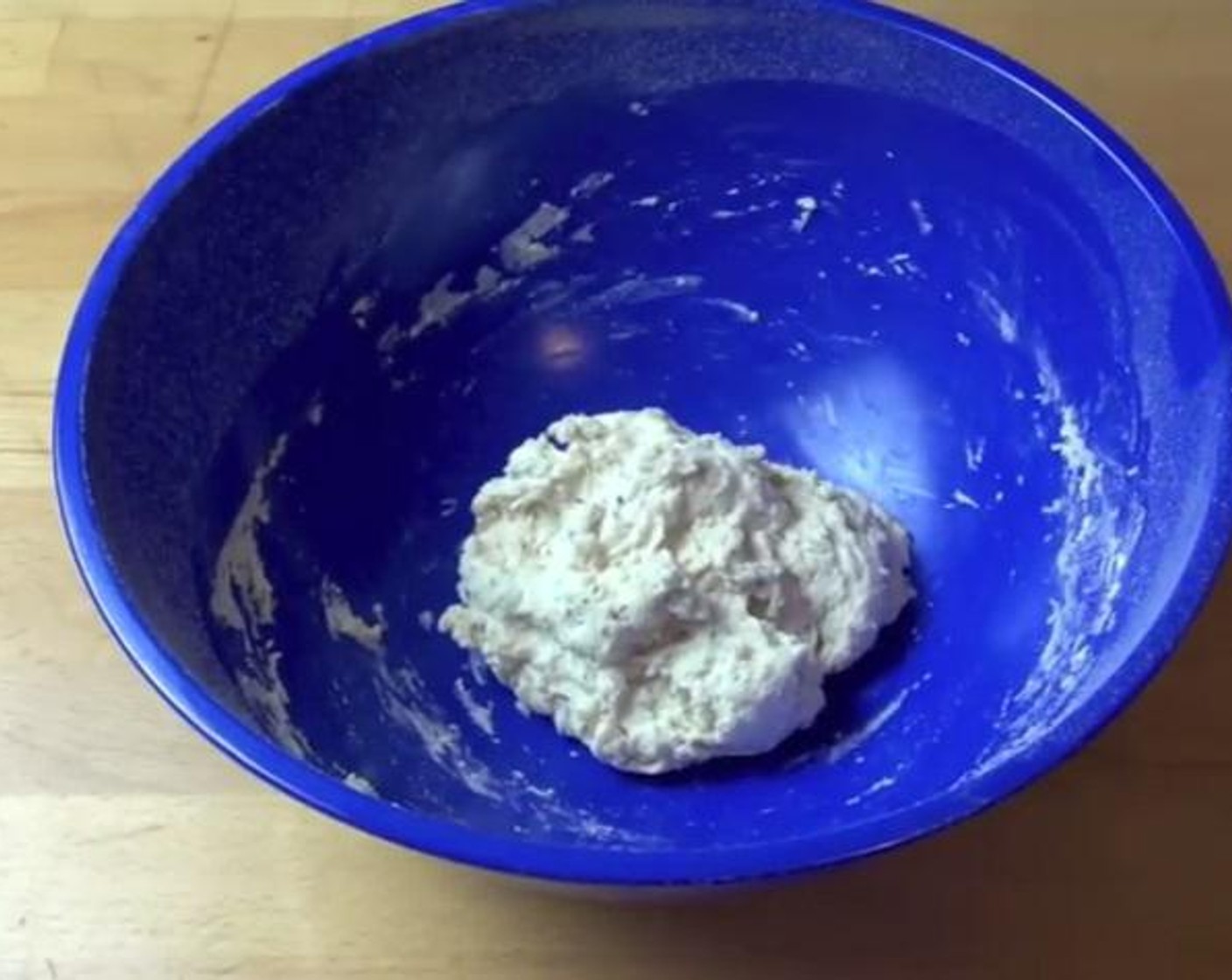 step 3 On a mixing bowl, mix together sift the All-Purpose Flour (1 cup). Add Dried Mixed Herbs (1/2 Tbsp) together with the yeast mixture. Mix together until you get a nice sticky dough.