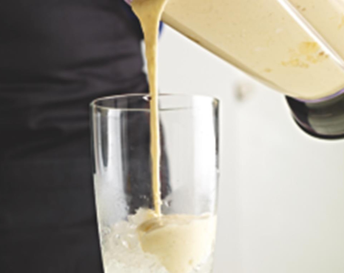 step 4 Pour the smoothie into the glasses over the ice, mix well, and enjoy!