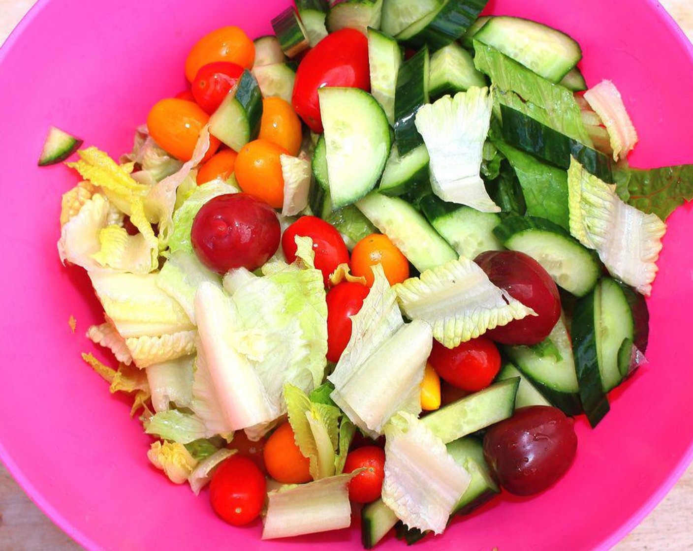 step 7 Dress romaine, Cherry Tomatoes (to taste), and cucumbers with Vinaigrette (to taste).