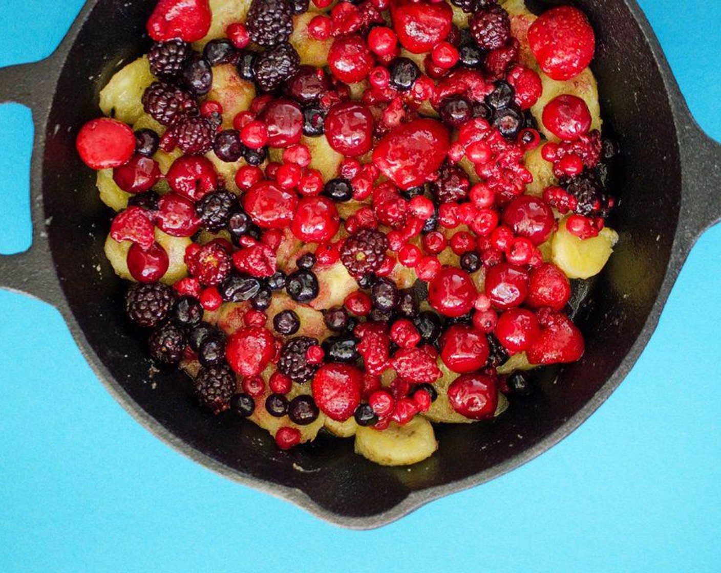 step 2 If you have a cast iron skillet, we’ll bake this right in the skillet. If you do not, grease a medium-sized baking dish and transfer bananas into the dish. Evenly layer Frozen Mixed Berries (2 1/2 cups) onto the bananas. In a separate bowl, mix Medium Grind Bulgur Wheat (1/2 cup), Old Fashioned Rolled Oats (1/2 cup), Brown Sugar (3 Tbsp), Salt (1/4 tsp) and Ground Cinnamon (1 tsp). Pour evenly over berries.