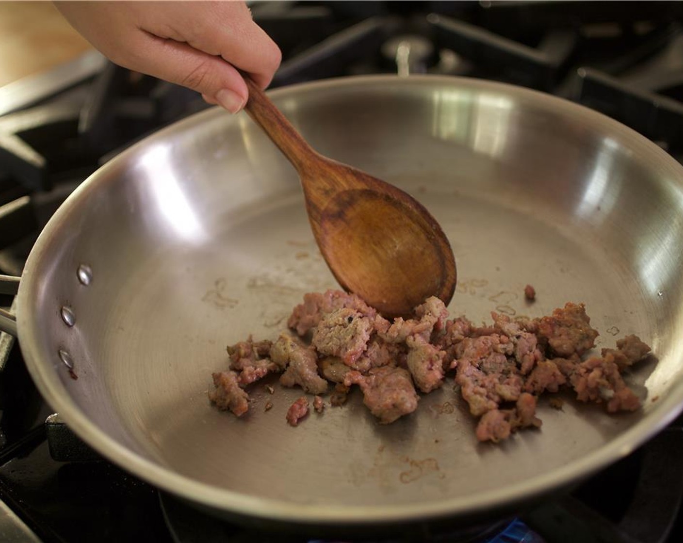 step 4 Meanwhile, heat a large saute pan over medium high heat. Add Olive Oil (1/2 tsp) to the pan and swirl pan evenly to coat the bottom. Remove casings from Turkey Sausage (1) and discard. Carefully add sausage to pan and cook for three minutes, breaking up with a spoon.