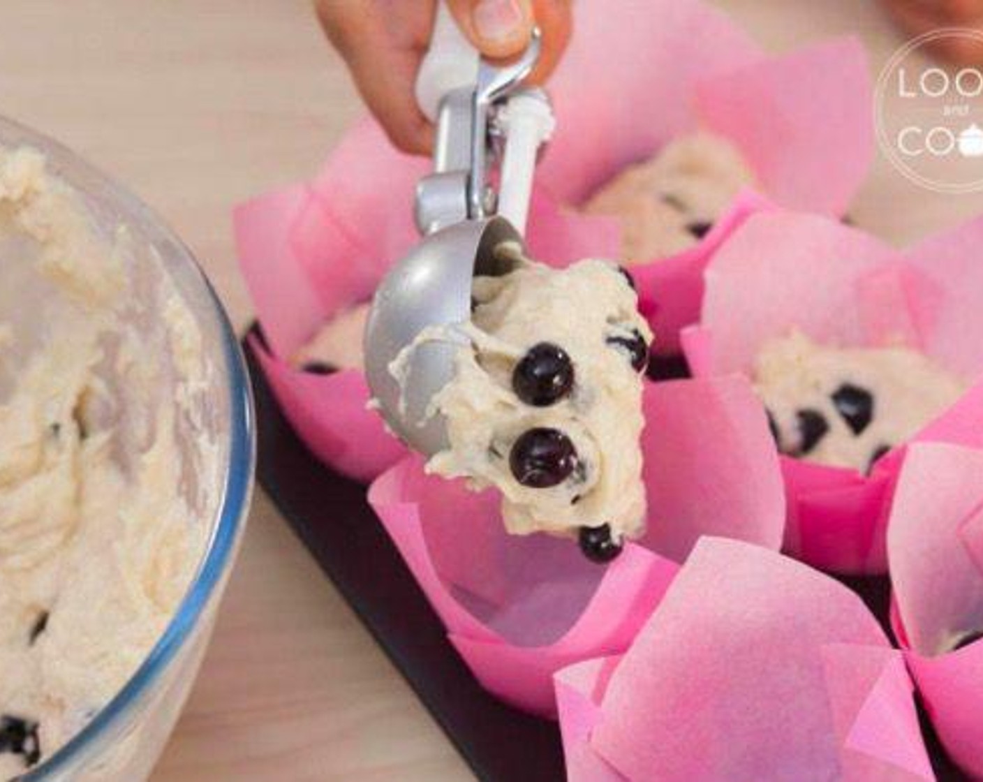 step 6 Use a ice cream scope or spoon to fill the muffin cups.