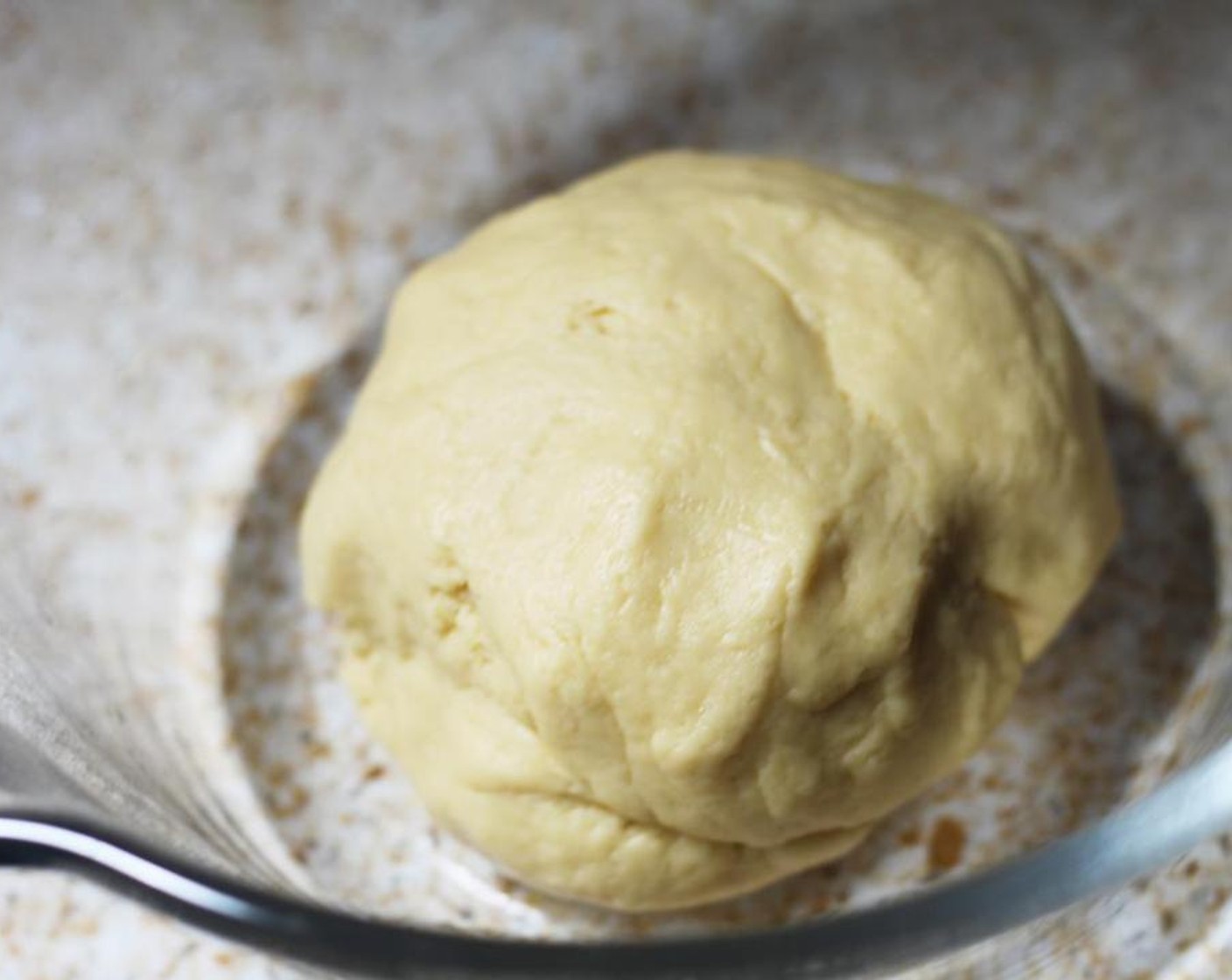 step 5 Place in a greased bowl, cover with a clean kitchen towel and set aside in a warm place to rise and double in size, around 45 minutes.