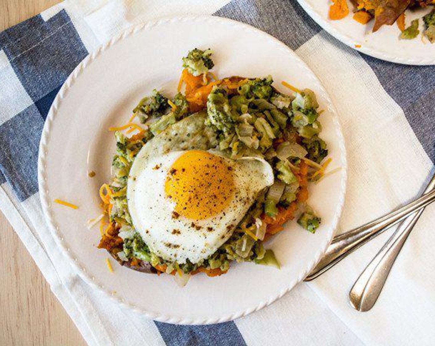 Broccoli Cheese Sweet Potatoes with Fried Egg