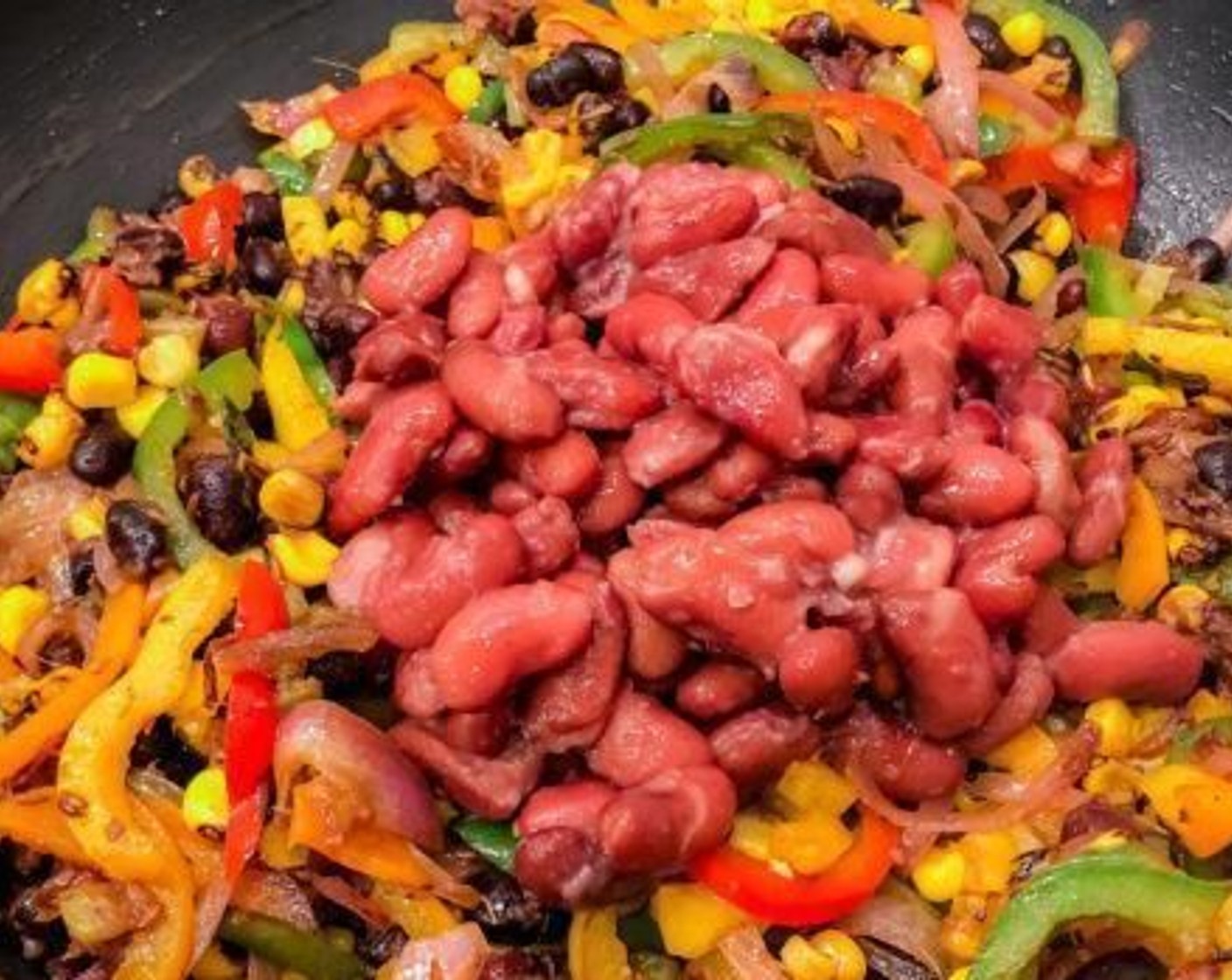 step 4 Add Frozen Corn Kernels (1/2 cup) and stir. Add Black Beans (4 Tbsp) and Red Kidney Beans (4 Tbsp). Give it a good stir.