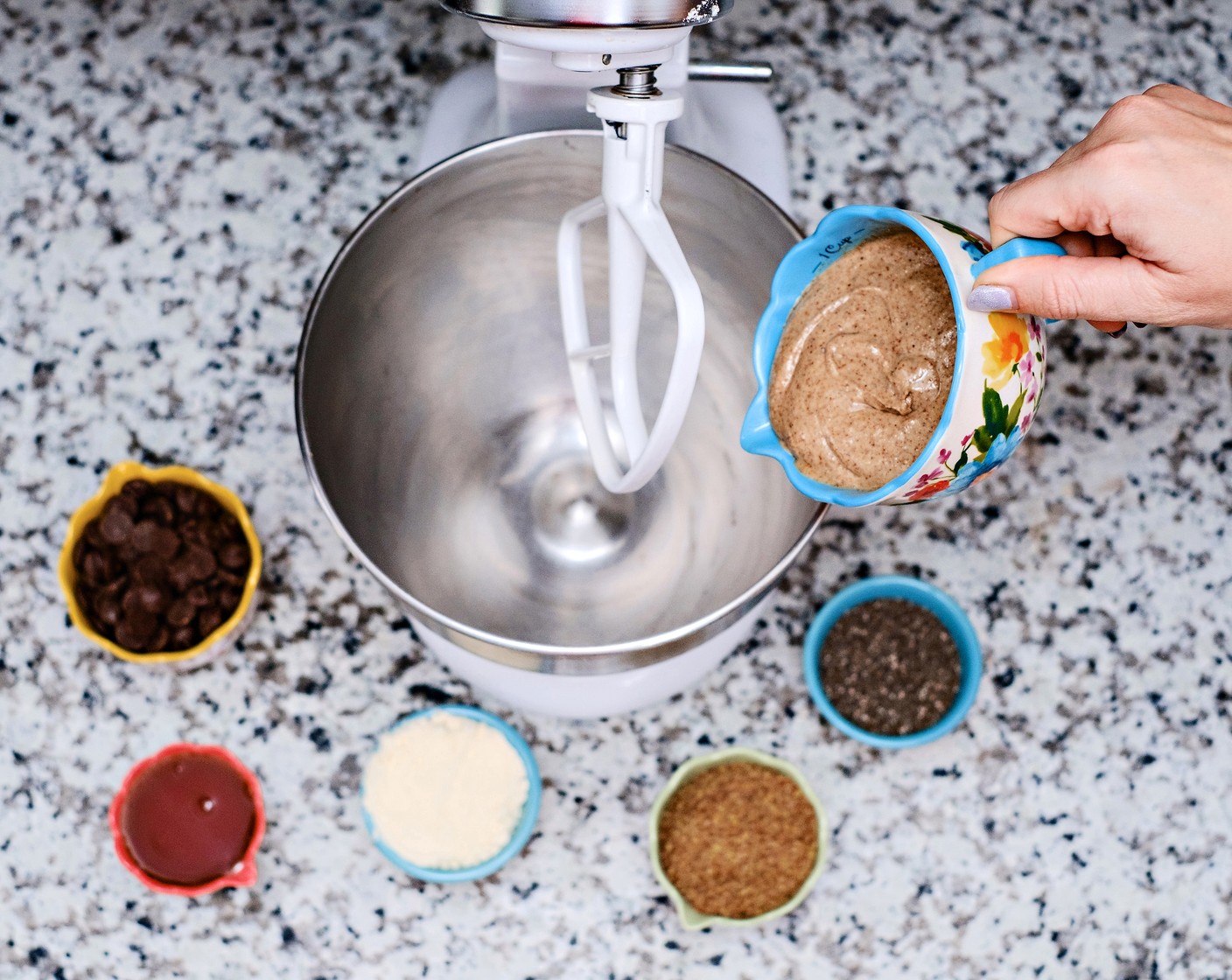 step 1 Combine the Almond Butter (1 cup), Chocolate Chips (1/2 cup), Flaxseeds (1/2 cup), Chia Seeds (1/2 cup), Honey (1/4 cup), and Vanilla Protein Powder (1/2 cup) in a mixing bowl.