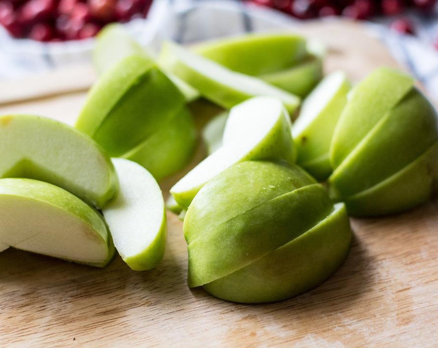 step 2 Once mixture above is boiling, add Fresh Cranberries (3 1/3 cups) and Granny Smith Apples (2 cups), gently stir until well combined. Reduce heat to low and allow mixture to simmer for 10-15 minutes, or until mixture has begun to thicken.