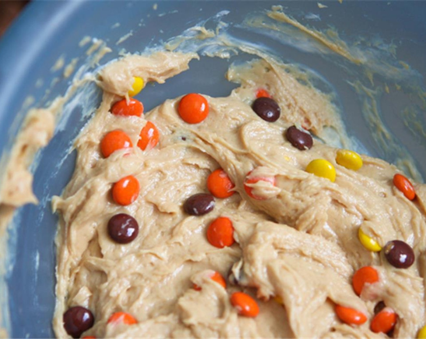 step 3 In a large bowl, beat Philadelphia Original Soft Cheese (1 cup) with hand-held mixer until fluffy. Add Sweetened Condensed Milk (1 can) and Creamy Peanut Butter (1/2 cup) and beat until smooth. Stir in the Reese's Pieces Candies (2 1/3 cups).