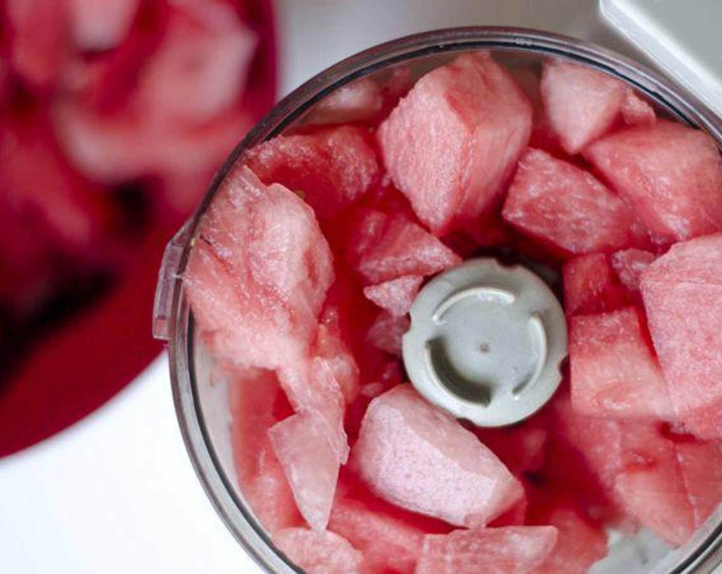 step 1 Scoop out the fruit of the Seedless Watermelon (1/4). In a blender or food processor, puree watermelon until it reaches a thin, even consistency. If you have seeds in your watermelon, strain them out in a mesh colander right about now.