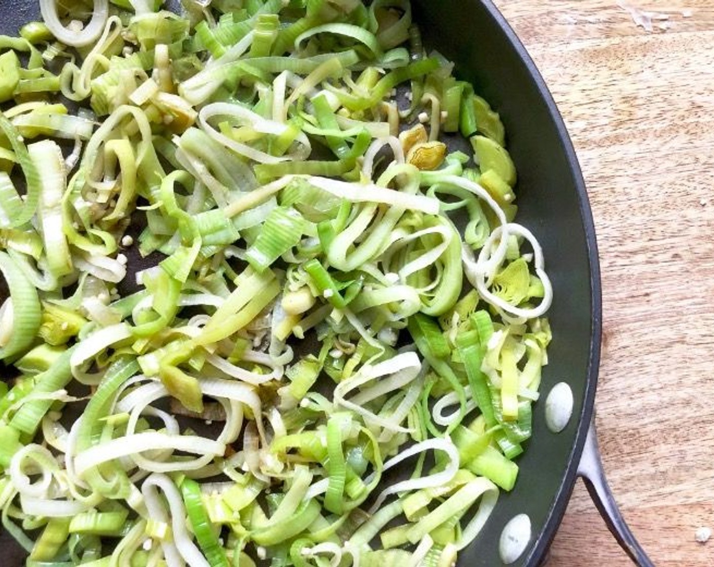 step 3 In the same skillet, add the Olive Oil (1 Tbsp). Add the Leeks (2) and cook, mixing often, until softened, 2-3 minutes.