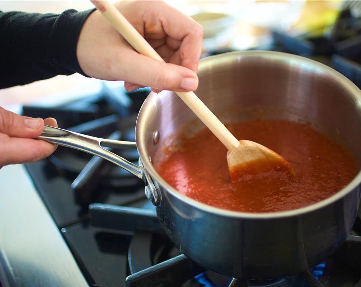 step 6 Add the Canned Crushed Tomatoes (3 1/3 cups), one cup of water, the Gochujang (2 Tbsp), and half of the Granulated Sugar (1 Tbsp). Reduce to medium low heat and simmer for 20 minutes. Remove from heat and hold for plating.