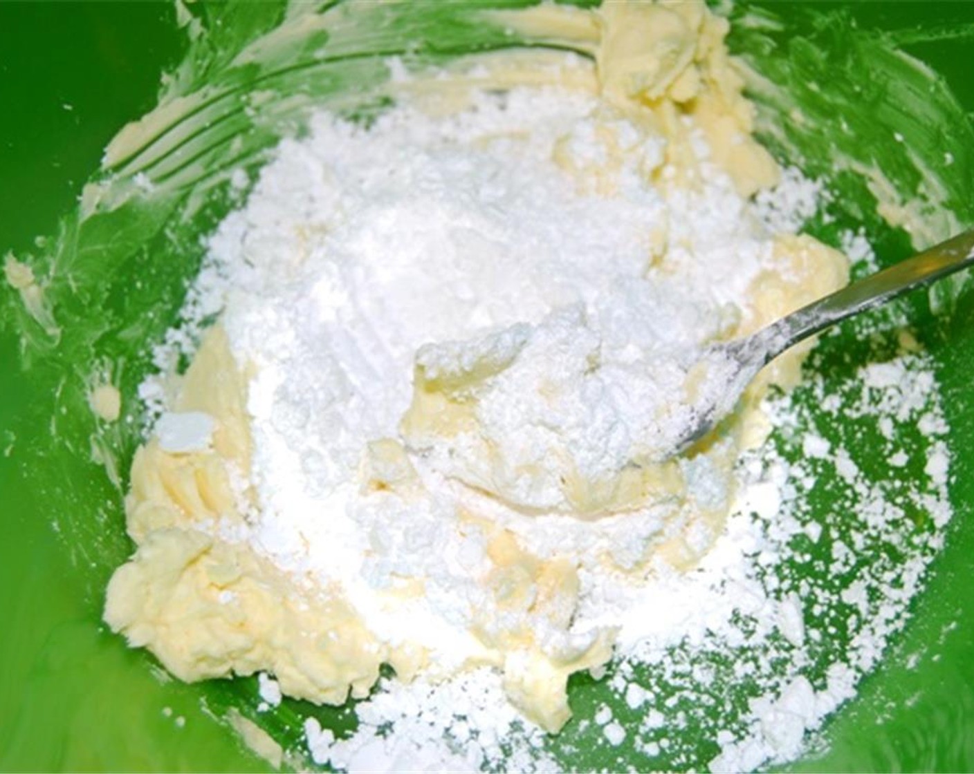 step 2 Add the Powdered Confectioners Sugar (1/2 cup) and Vanilla Extract (1 tsp) and beat until smooth, about 2 minutes.