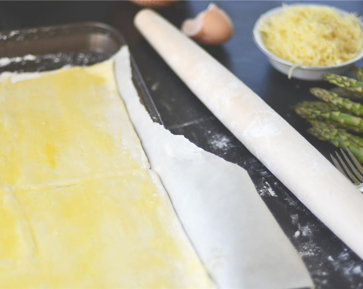 step 6 Lightly brush the puff pastry with Egg (1). Sprinkle with Salt (to taste) and Ground Black Pepper (to taste).