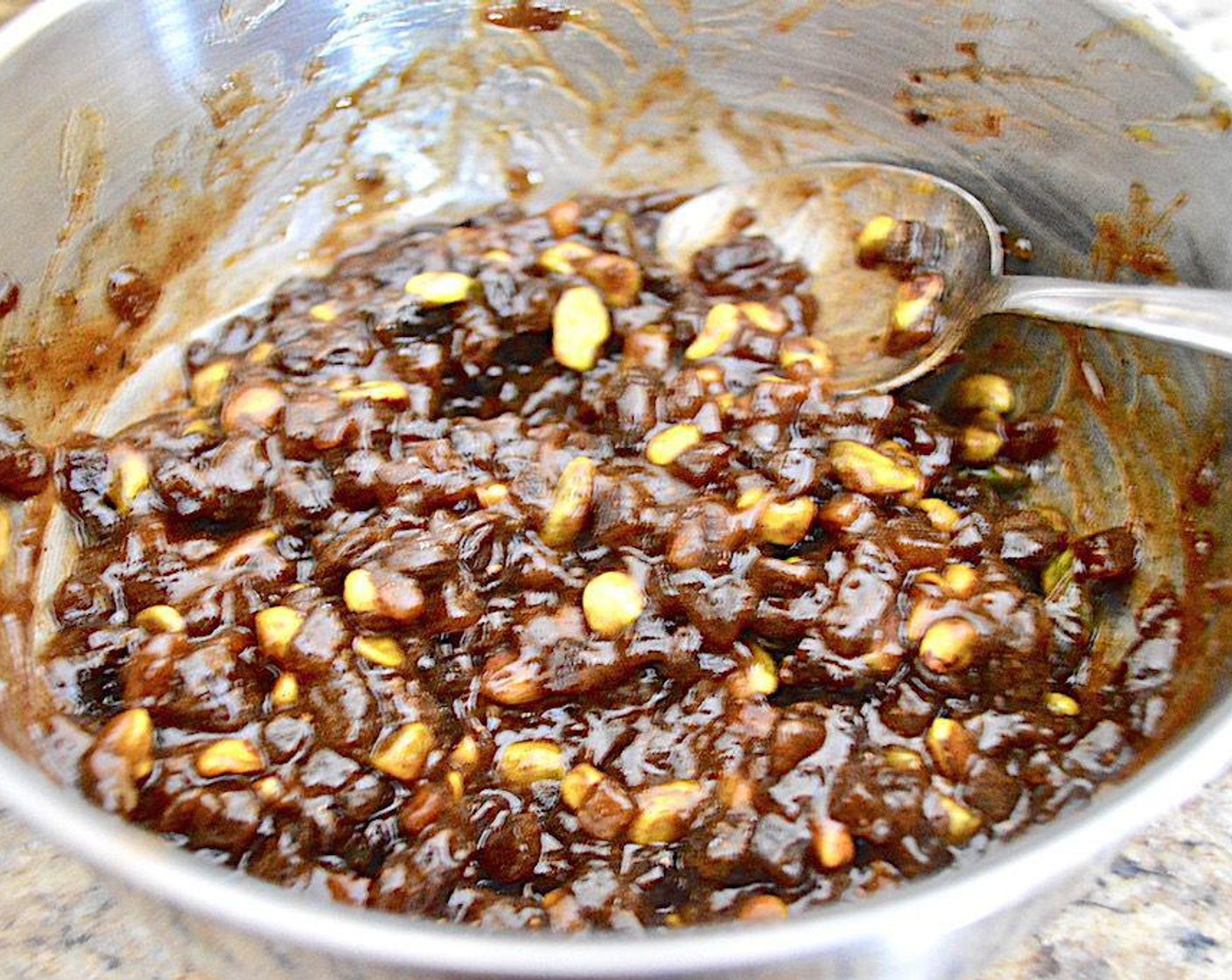 step 6 While the dough rises, make the filling. Stir the Jarred Fruit Mincemeat (3 cups), Pistachios (1 cup), Sunkist Orange (1), Ground Cinnamon (1 Tbsp), and Ground Nutmeg (1/2 tsp) together thoroughly in a medium bowl.