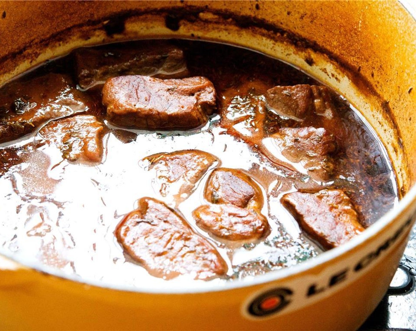 step 10 Once the beef is cooked, remove it from the oven and let it cool down, the fat will float to the surface as it cools. If you'd like to, you can remove the fat now.