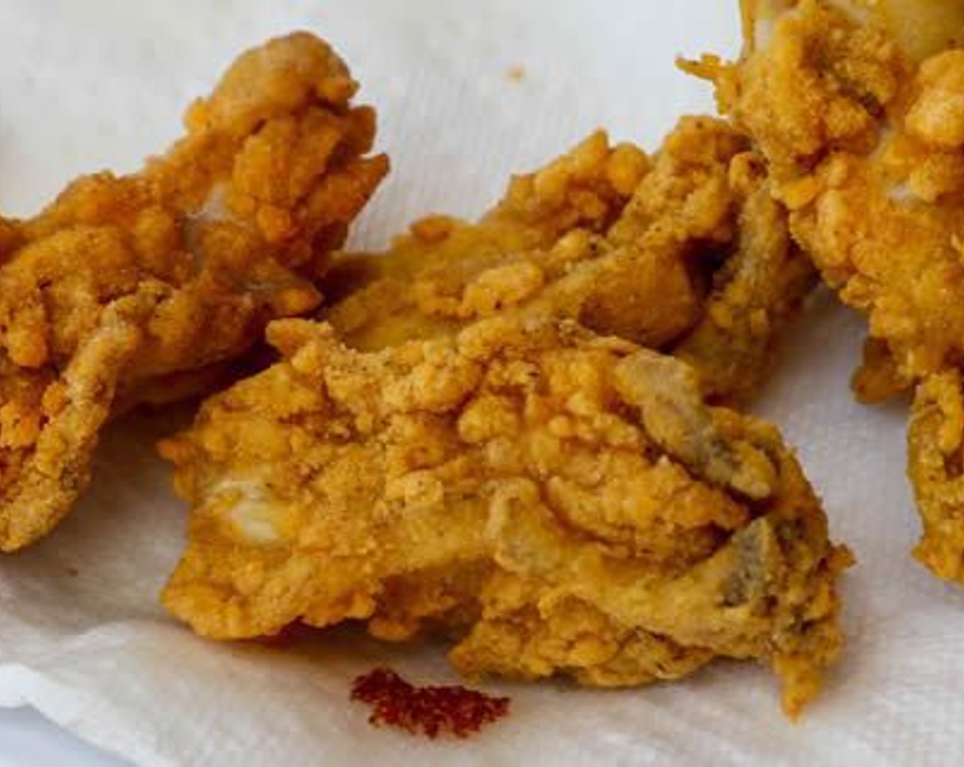 step 9 Fry oysters in 375 degrees F (190 degrees C) peanut oil for about a minute or until golden brown. Drain on paper towel lined platter.