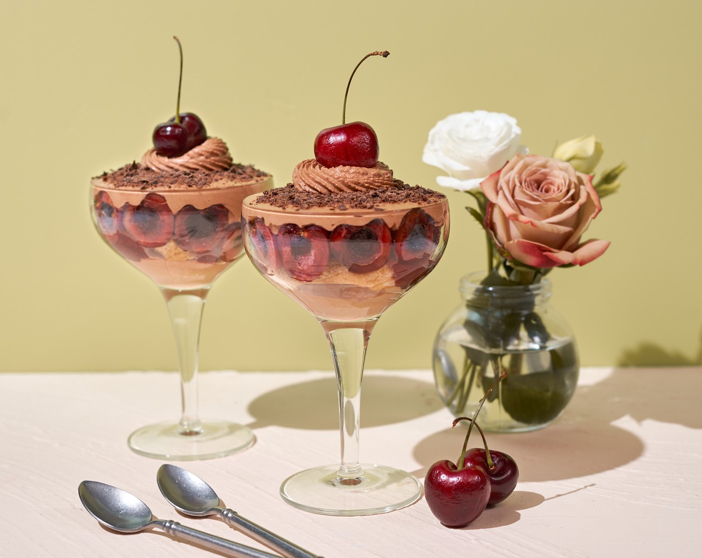 step 6 Garnish with Chocolate Shavings (4 Tbsp) and mousse over the top along with the whole cherry.